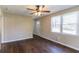 Inviting living room featuring hardwood floors, ceiling fan, and natural light at 1951 Brannen Se Rd, Atlanta, GA 30316