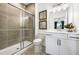 Bathroom featuring a glass shower and modern fixtures at 2550 Bertrand Way, Cumming, GA 30041