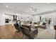 Spacious open floor plan combining a living area, dining space, and a modern kitchen at 2550 Bertrand Way, Cumming, GA 30041