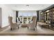Inviting sitting area with comfortable seating, bright windows, and a serene atmosphere at 2550 Bertrand Way, Cumming, GA 30041