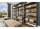 A serene sitting area with elegant shelves and decor at 2550 Bertrand Way, Cumming, GA 30041