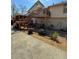 Spacious backyard with a large wooden deck, perfect for outdoor entertaining and relaxation at 321 Roses Creek Dr, Lawrenceville, GA 30044