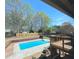 A great backyard features an in-ground pool, a patio, and a deck, perfect for relaxing and entertaining at 321 Roses Creek Dr, Lawrenceville, GA 30044