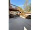 Spacious backyard with a covered patio, providing a relaxing outdoor space near a refreshing pool at 321 Roses Creek Dr, Lawrenceville, GA 30044