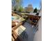 Elevated view of the backyard featuring a covered patio area, pool, and well-maintained lawn at 321 Roses Creek Dr, Lawrenceville, GA 30044
