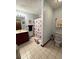 Bathroom features a shower with a lighthouse-themed curtain, and tile floors at 321 Roses Creek Dr, Lawrenceville, GA 30044