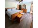 Bedroom with wood floors, furniture, and natural light at 321 Roses Creek Dr, Lawrenceville, GA 30044