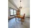 Bright dining room with natural light, complemented by classic wooden furniture at 321 Roses Creek Dr, Lawrenceville, GA 30044