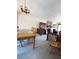 Open dining and living area featuring a cozy stone fireplace and comfortable seating at 321 Roses Creek Dr, Lawrenceville, GA 30044