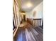 Inviting hallway with stylish laminate flooring and ample natural light, creating a warm and welcoming atmosphere at 321 Roses Creek Dr, Lawrenceville, GA 30044