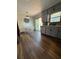 Charming kitchen featuring gray cabinets, stainless steel appliances, and an adjacent dining area at 321 Roses Creek Dr, Lawrenceville, GA 30044