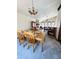 Open dining and living area with natural light, stone fireplace and comfortable seating at 321 Roses Creek Dr, Lawrenceville, GA 30044