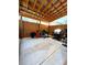 Outdoor patio with a wooden pergola covering a concrete base with a wood fence for privacy at 321 Roses Creek Dr, Lawrenceville, GA 30044