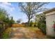Backyard featuring partial fence and storage shed at 1420 Elizabeth Ln, East Point, GA 30344