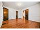 Bright bedroom featuring hardwood floors, neutral walls, and natural light at 1420 Elizabeth Ln, East Point, GA 30344