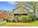Charming single-story home with a covered front porch and mature landscaping at 1420 Elizabeth Ln, East Point, GA 30344