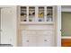 Built-in glass door storage cabinet with drawers at 1420 Elizabeth Ln, East Point, GA 30344