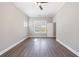 Bedroom has hardwood floors, neutral walls, ceiling fan and natural light at 2620 Oak St, Atlanta, GA 30344