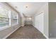 Bedroom with plush carpeting, neutral walls, double windows and spacious double door closet at 2620 Oak St, Atlanta, GA 30344