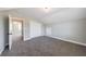 Bedroom showcases plush carpeting, neutral walls, large closet, and an adjoining hallway at 2620 Oak St, Atlanta, GA 30344