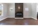 Cozy living room featuring a fireplace and hardwood floors at 2620 Oak St, Atlanta, GA 30344