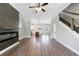 Living Room showcases hardwood floors, a fireplace, and open-concept access to the kitchen at 2620 Oak St, Atlanta, GA 30344
