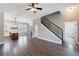 Open-concept living room and kitchen with hardwood floors and modern finishes at 2620 Oak St, Atlanta, GA 30344