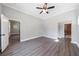Main bedroom with multiple entryways and hardwood floors throughout at 2620 Oak St, Atlanta, GA 30344