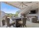 Outdoor space with a table and chairs, ceiling fan, and string lights at 312 Concord St, Alpharetta, GA 30009