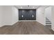 Large basement with dark accent wall and recessed lighting at 312 Concord St, Alpharetta, GA 30009
