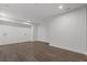Spacious basement featuring hardwood floors and recessed lighting at 312 Concord St, Alpharetta, GA 30009