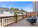 Outdoor deck with seating, wood railings, and a view of the neighborhood at 312 Concord St, Alpharetta, GA 30009