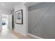Entryway featuring modern wood flooring and a decorative accent wall at 312 Concord St, Alpharetta, GA 30009