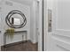 Hallway with hard wood floors, accent table, and an elevator at 312 Concord St, Alpharetta, GA 30009