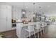 Spacious kitchen with a large island, modern appliances, and hardwood floors at 312 Concord St, Alpharetta, GA 30009