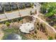 Overhead shot of a beautifully landscaped park with walking trails, mature trees, and a peaceful pond with benches at 312 Concord St, Alpharetta, GA 30009
