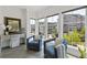 Cozy sitting area filled with natural light, featuring comfortable armchairs and a stylish desk at 312 Concord St, Alpharetta, GA 30009