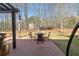 Relaxing patio space with a seating area, perfect for outdoor gatherings at 7090 Blue Sky Drive, Locust Grove, GA 30248