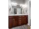 Bathroom with double sinks and vanity at 7090 Blue Sky Drive, Locust Grove, GA 30248