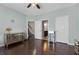 The bedroom has hardwood floors and is spacious at 7090 Blue Sky Drive, Locust Grove, GA 30248