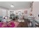 Bright living room offering hardwood floors, stylish decor, and ample seating at 7090 Blue Sky Drive, Locust Grove, GA 30248