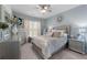 Comfortable main bedroom with a large bed and light grey walls at 7090 Blue Sky Drive, Locust Grove, GA 30248