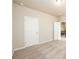 Bedroom with neutral carpeting, paint and easy access to other areas at 8245 Dawson View Way, Cumming, GA 30028