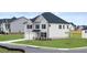 Attractive two-story home boasting a well-maintained lawn at 1099 Blue Juniper Cir, Loganville, GA 30052