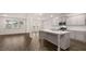 Modern kitchen featuring a large island, stainless appliances, and ample cabinet space at 1099 Blue Juniper Cir, Loganville, GA 30052