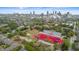 Aerial view shows the football field surrounded by cityscape, trees, and buildings under the sky at 1115 Martin Luther King Jr Sw Dr, Atlanta, GA 30314