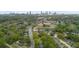 This is an aerial view of a commercial property, the Atlanta skyline, and a sports field at 1115 Martin Luther King Jr Sw Dr, Atlanta, GA 30314