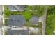 Aerial view shows a home with a dark roof, green yard and a detached garage at 1115 Martin Luther King Jr Sw Dr, Atlanta, GA 30314