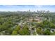 This is an aerial view of a commercial property, the Atlanta skyline, and a sports field at 1115 Martin Luther King Jr Sw Dr, Atlanta, GA 30314