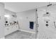 Stylish bathroom featuring a tiled shower and a dual vanity with granite countertops and modern fixtures at 1115 Martin Luther King Jr Sw Dr, Atlanta, GA 30314